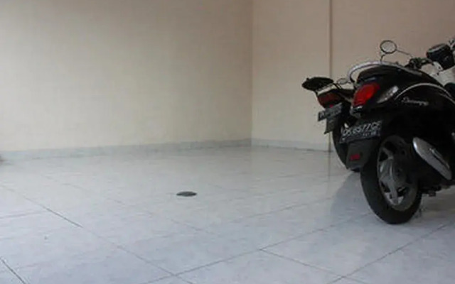 Nida Rooms Gelogor Carik Denpasar at Guest House Orchid