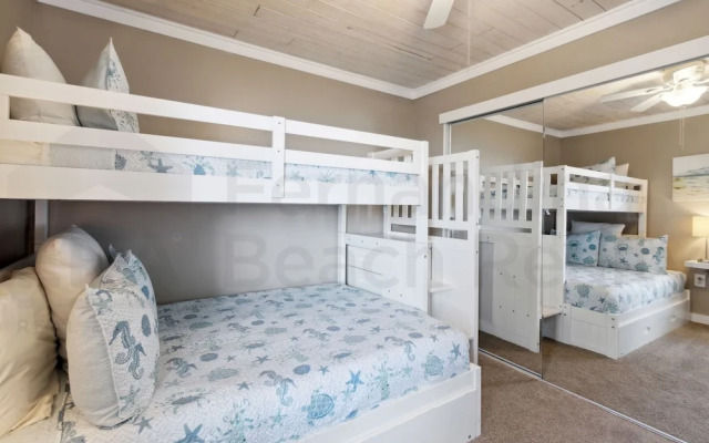 Newly Remodeled Oceanfront Condo with Salt Water Pool and Private Walkway to Beach by RedAwning