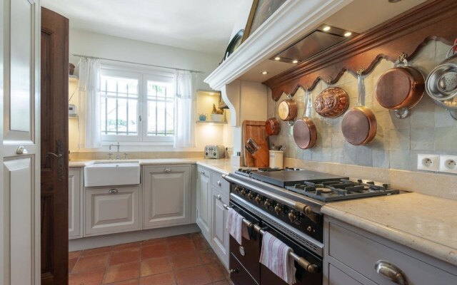 Provencal in a Height Overlooking Greenery