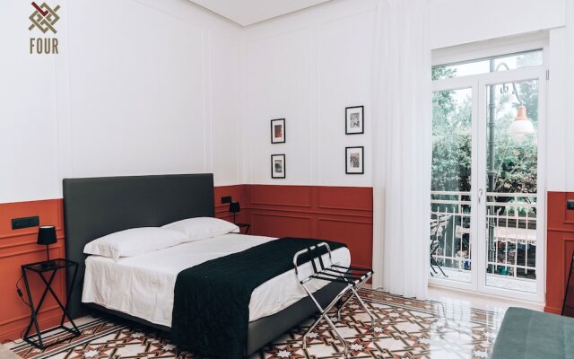 Four - Acanfora Suites