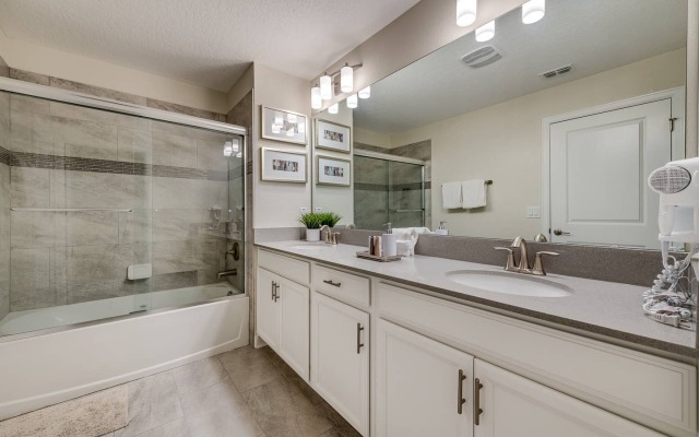 Elegant home with themed bedrooms near Disney