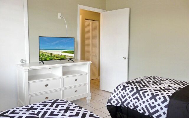 Peaceful Condo With Pool and Steps to Beach