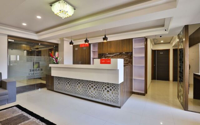 Capital O 15229 Hotel Radhe Residency