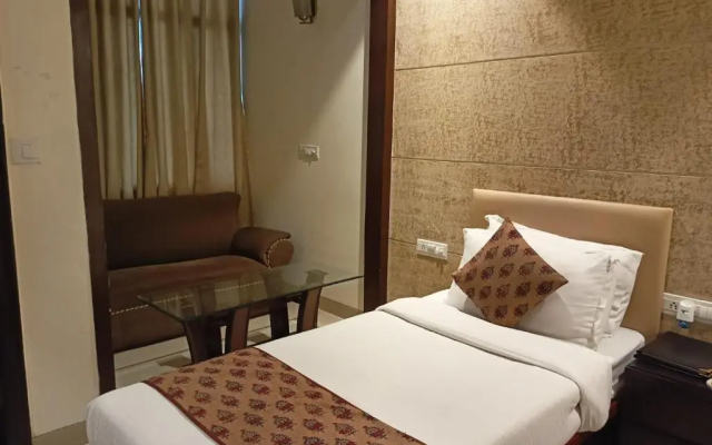 Cosy Grand @Chanakyapuri by The Cosy Hotels.