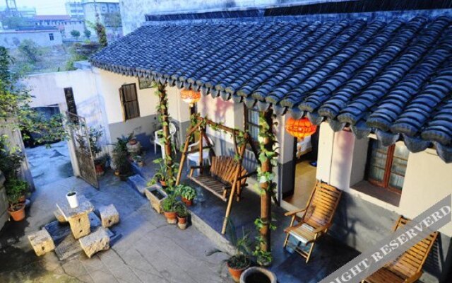Xitang Xi Le Ju Inn