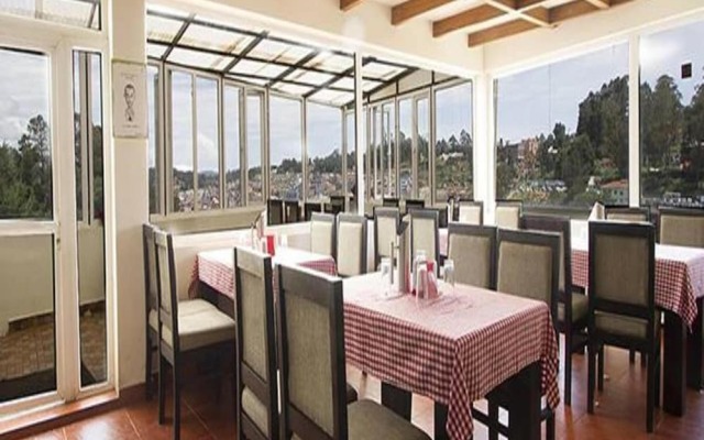 FabHotel Sholas Residency