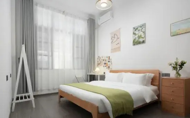 Sanchen XiaoyangBuilding Homestay