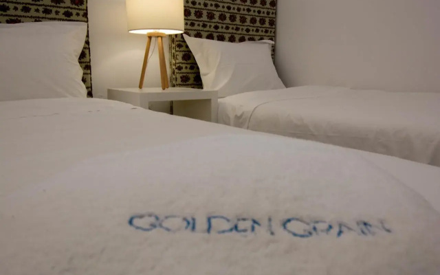 Golden Grain Suites by Checkin