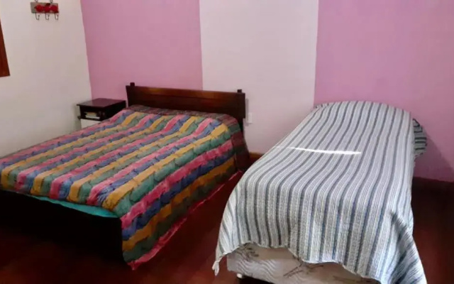 Casa da mata com piscina natural em condomínio