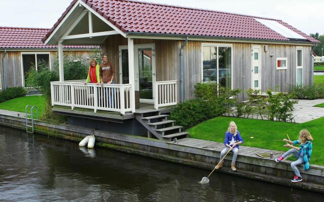 Cozy Chalet Right on the Water in Friesland