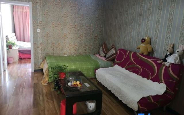 Tiantiansheng Warm Theme Apartment