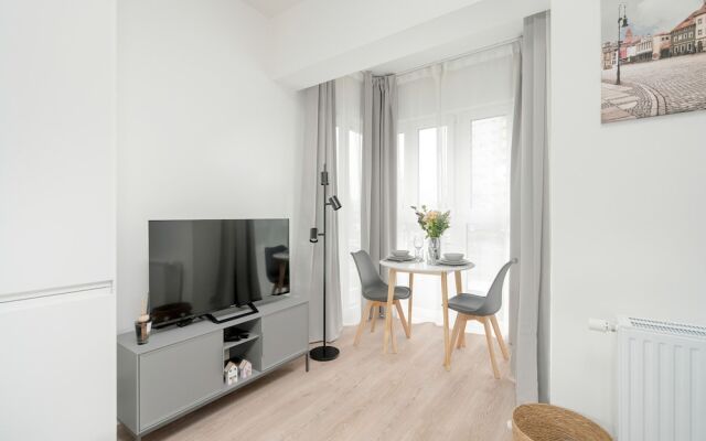 Minimalist Studios in Poznań by Renters