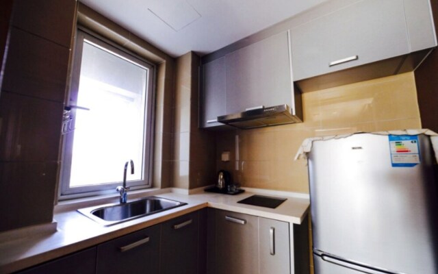 Dalian Yijia Apartment Peace Square