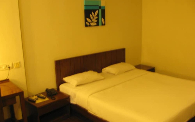 OYO 391 Shetty Gardenia Hotel