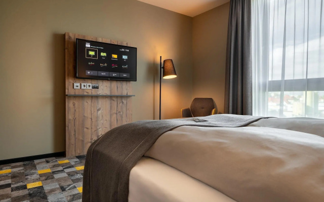 Отель Holiday Inn - the niu, Timber Esslingen, an IHG Hotel