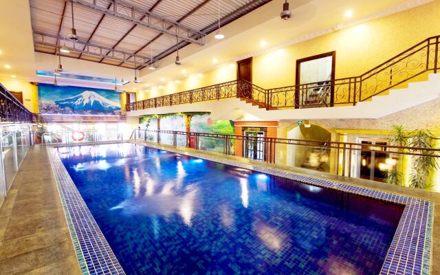 Amos Cozy Hotel & Convention Hall