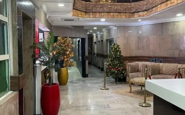 Brick Rock Hotel And Suites