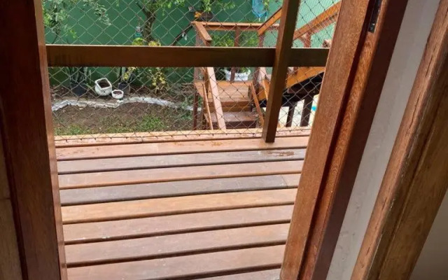 Casa de mãe aconchegante com piscina próximo à praia