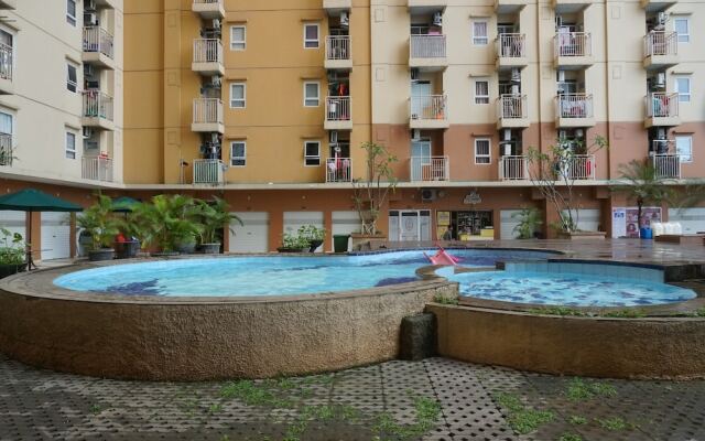 Homey Studio Apartment At Green Palm Residence