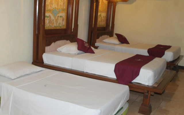 Отель Melasti Kuta Beach Hotel and Spa