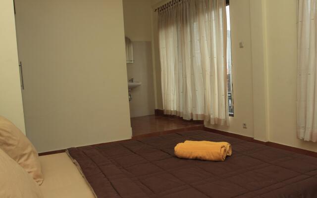 Purnama House