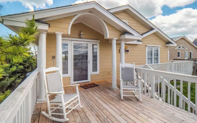 A Charm of Finches by Topsail Realty