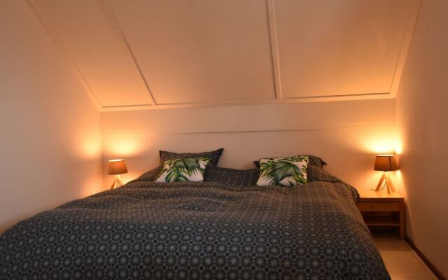 Exclusive Holiday Home Floating on a Lake in Friesland