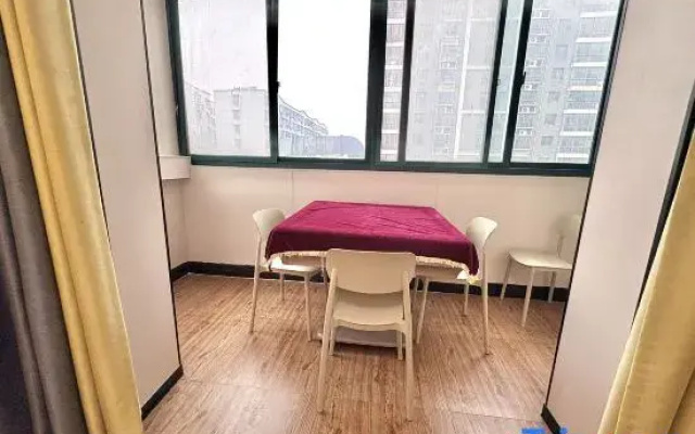Xinyang Bauhinia Hotel