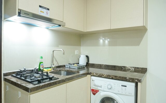 Strategic Location 1BR Apartment @ Puri Mansion near Puri By Travelio