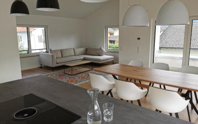 Chalethaus-Chiemsee - 120qm Panorama-Chaletwohnung am Chiemsee - Neubau