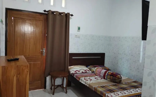 OYO 91233 Bismo 85 Family Syariah