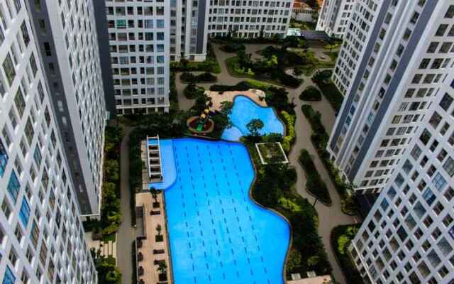 Warm and Cozy 3BR at M-Town Residence By Travelio