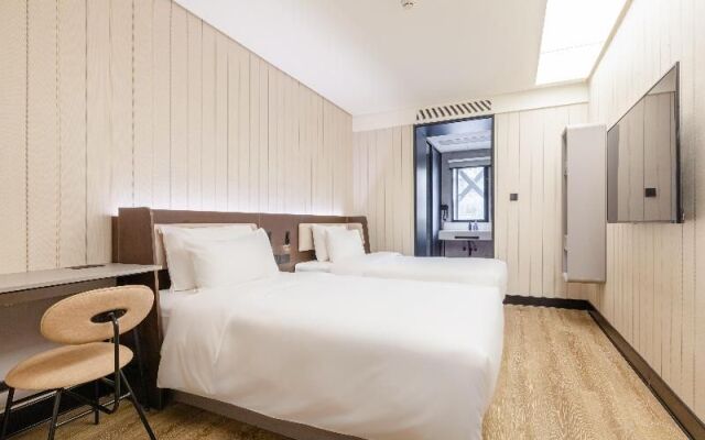 Отель Hanting Hotel Beijing Wangfujing Street Branch