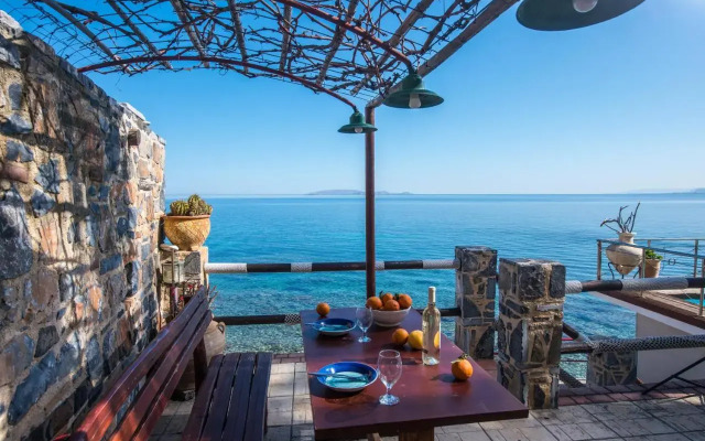 Exclusive Seaside Retreat with Shared Pool & Private Beach Access