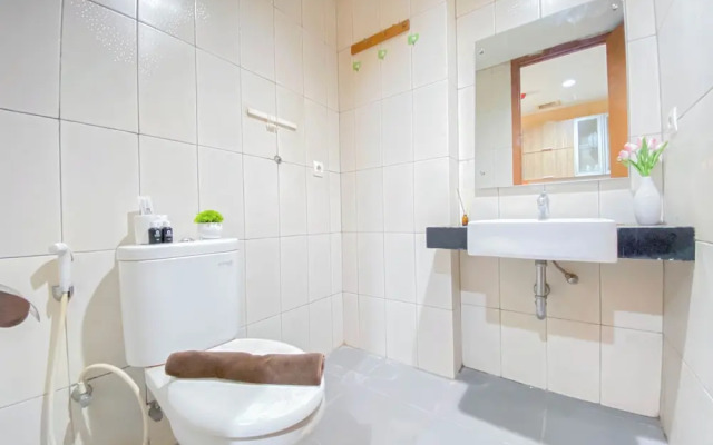 Homey and Comfortable 1BR Apartment at Dago Suites