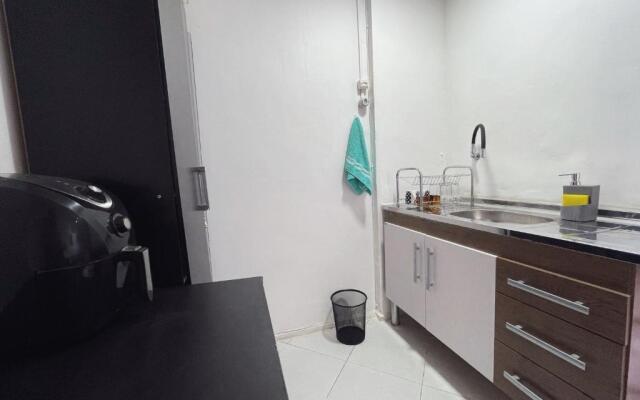 Loft com vista lateral para o mar