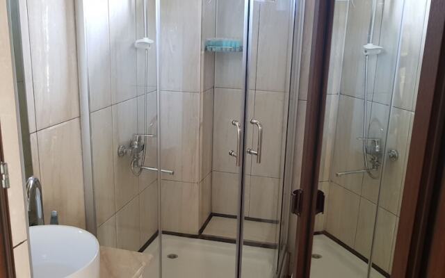 Mgzavrebi Gonio Aparthotel
