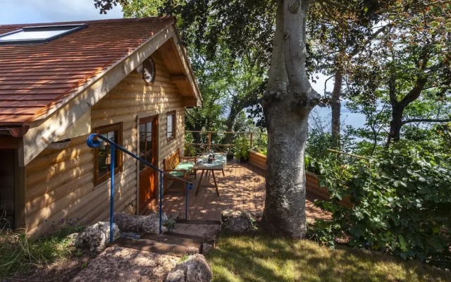 Porthole Log Cabin