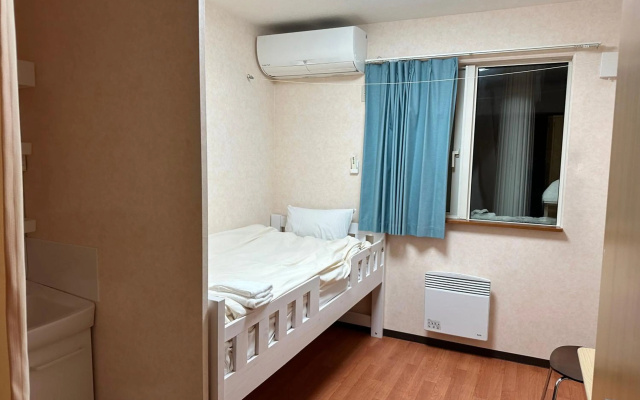 Alpine Guesthouse – Guest Rooms – Furano