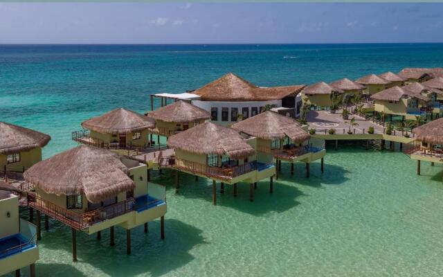 Palafitos Overwater Bungalows at El Dorado Maroma Gourmet Inclusive® Resort by Karisma