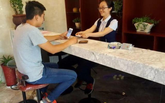 Huanle Business Hotel