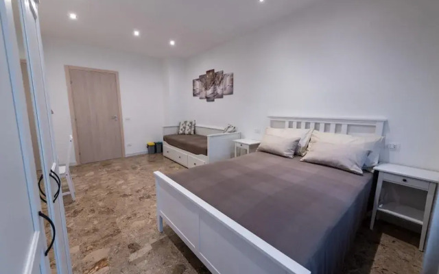 Casa Rosa Beige e Blu