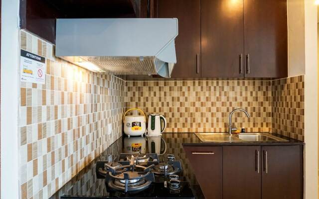 Cozy 2BR at Empyreal Epicentrum Apartment By Travelio