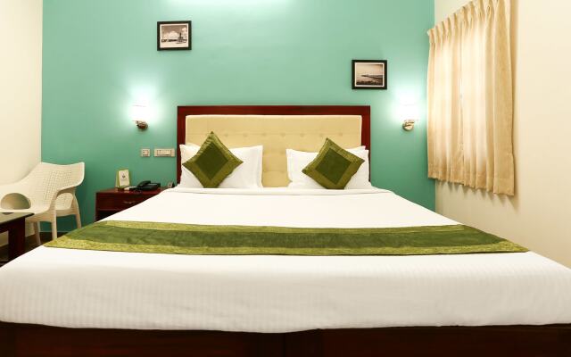 Treebo Grace Inn, 3 Min Walk From Promenade Beach