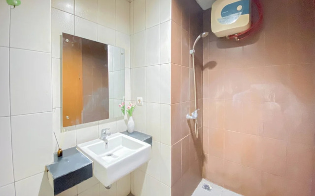 Homey and Comfortable 1BR Apartment at Dago Suites