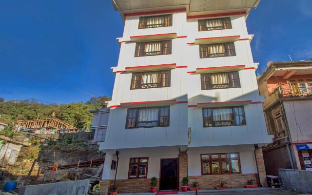 Collection O O 66148 Kuti Ghar Residency