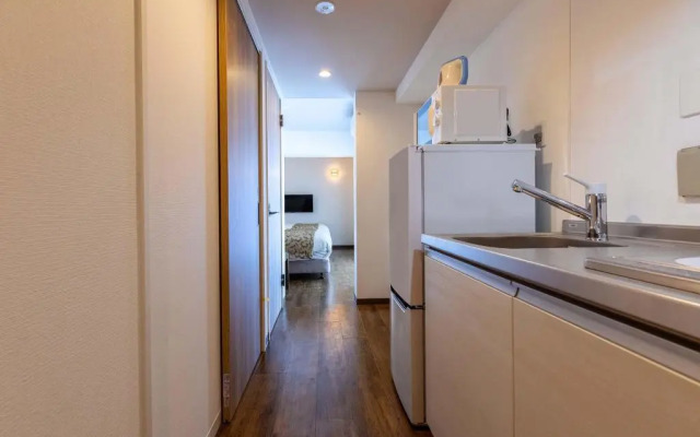 Mr.KINJO in front of Manza Beach