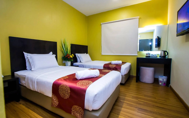 Capital O 91074 Grand World Hotel