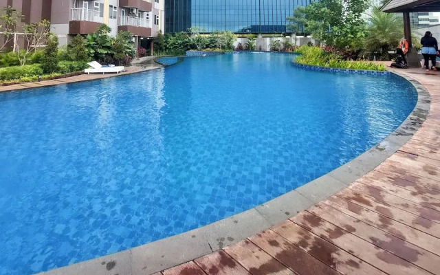 Restful and Comfy Studio Podomoro City Deli Medan Apartment
