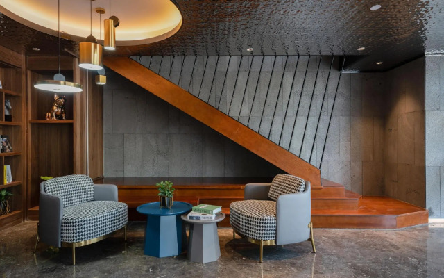 Ginza Jiayue Select Hotel (Qihe Wanda Plaza Spring City Oulebao)